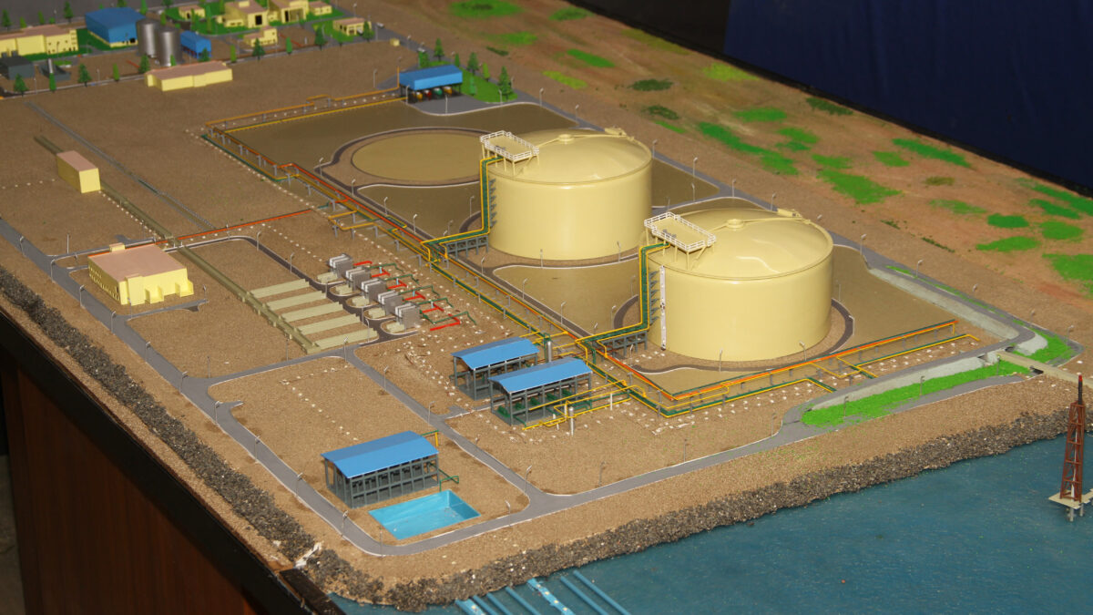 Color-coded industrial scale model showing factory equipment, piping and plant layout